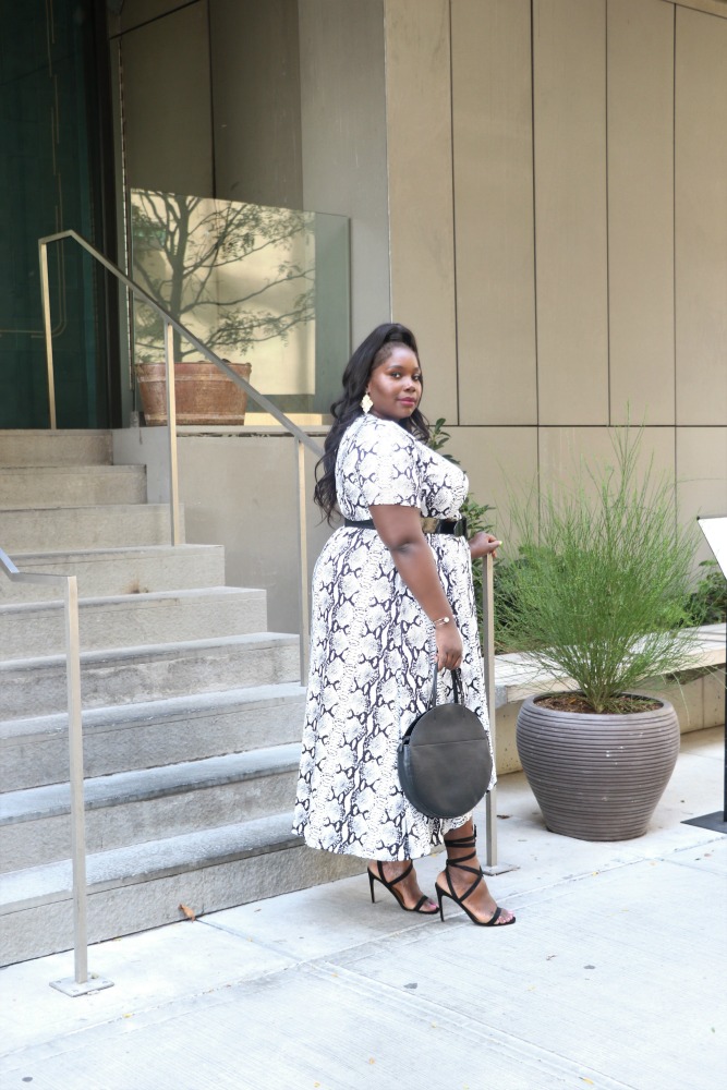 plus size woman in snakeskin print dress